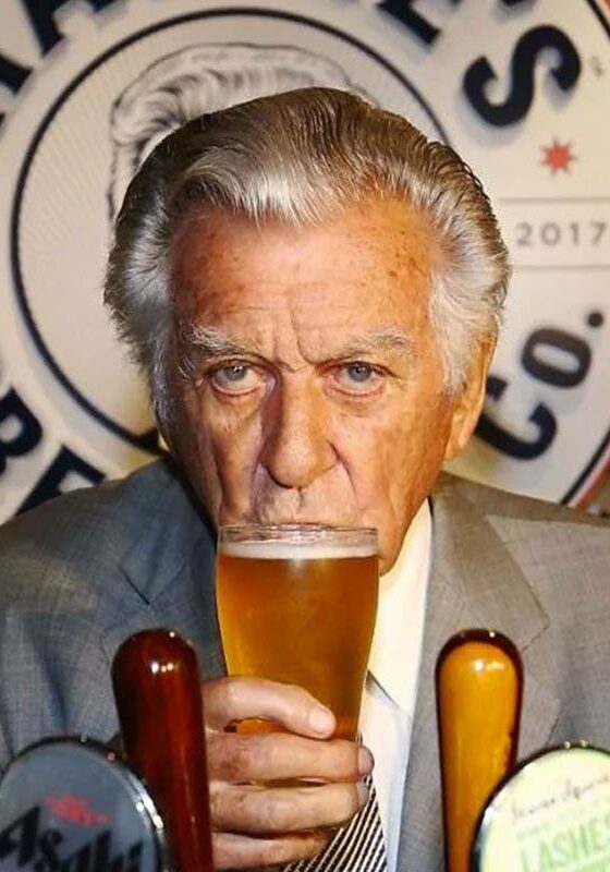 Bob Hawke drinking a lager.